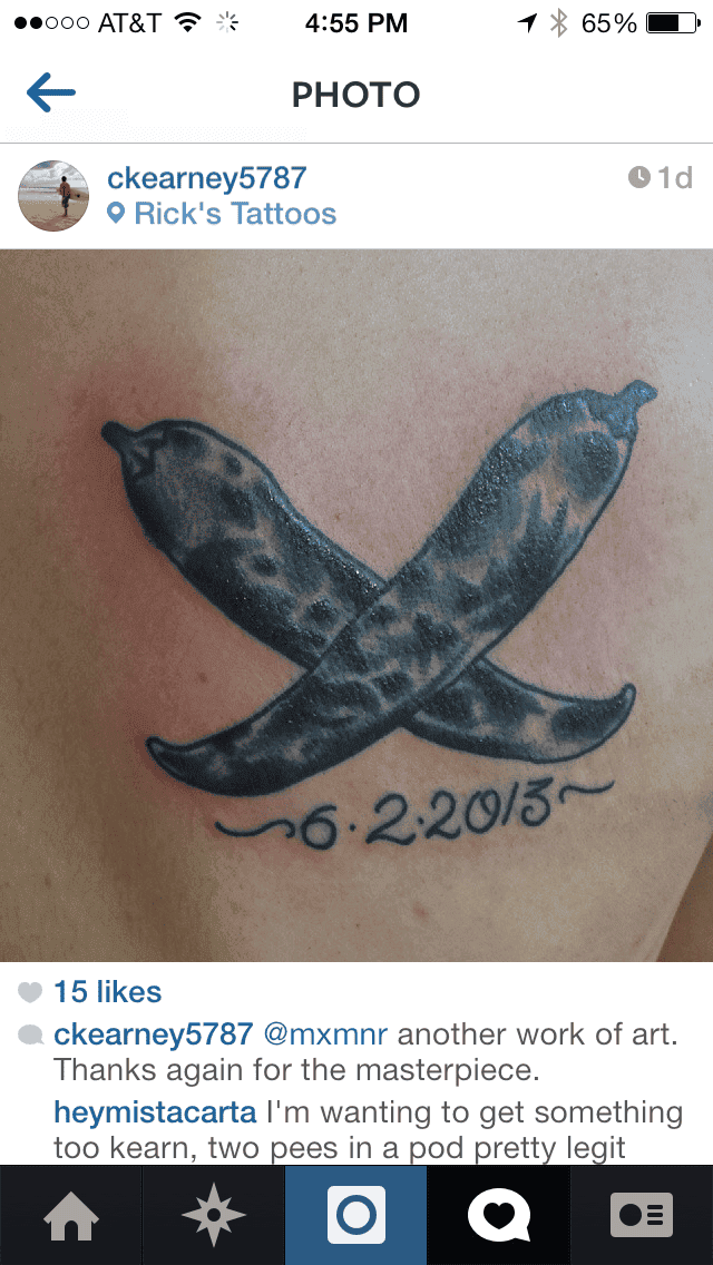 Crossed pencils tattoo
